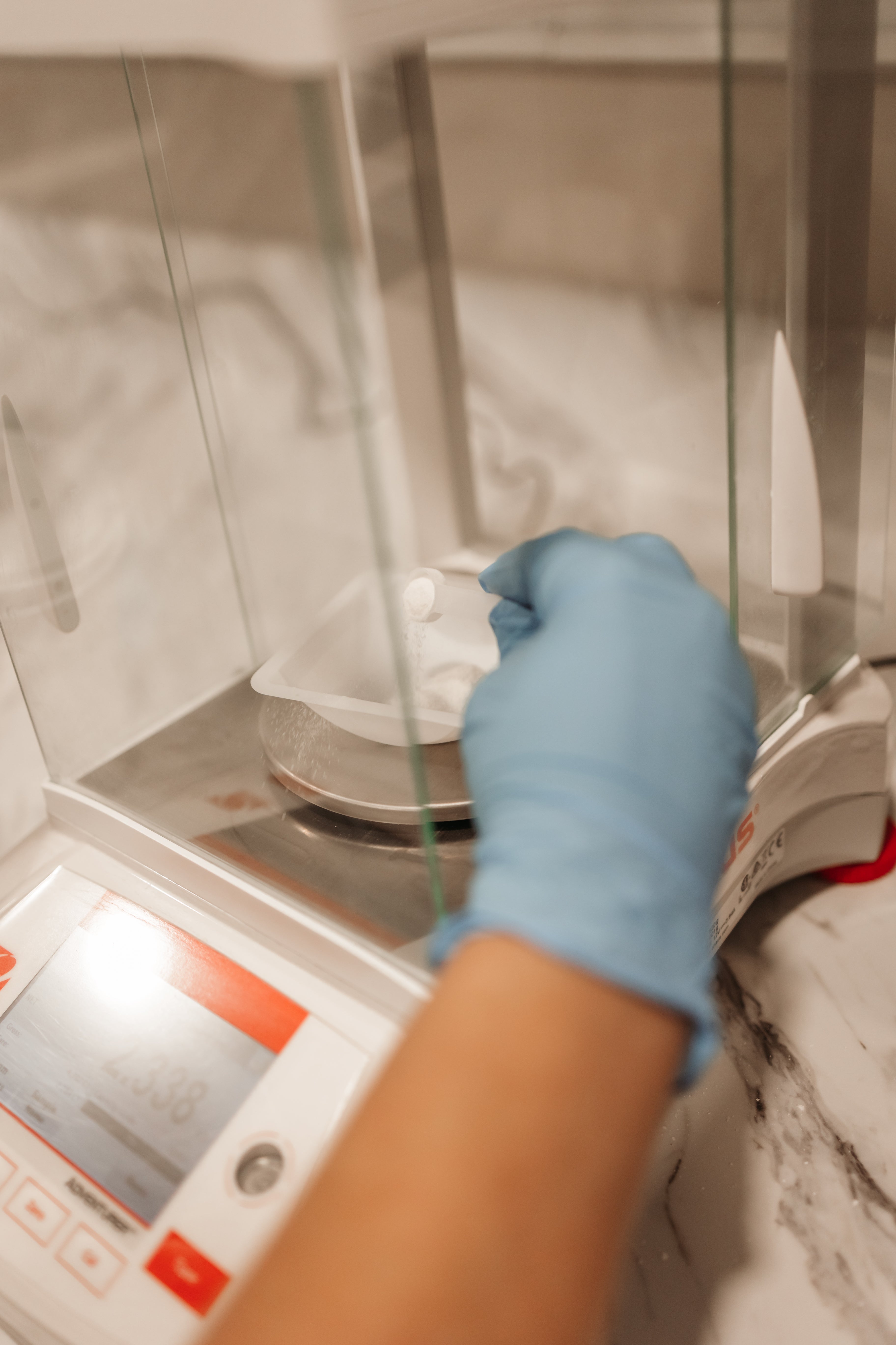 Staff member doing compounding